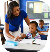 teacher teaching the kid to write