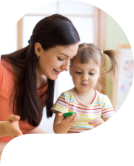 woman and little girl smiling