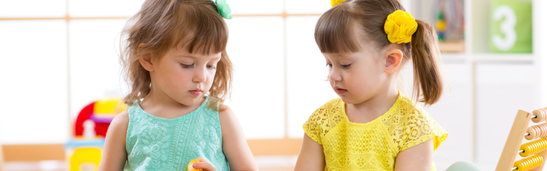 two kids girl playing together